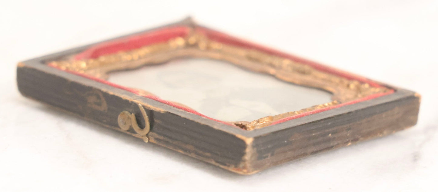 Lot 060 - Antique 1/9th Plate Tintype Photograph Of Young Man With Long Dark Hair And Giant Bowtie Smoking A Cigar, In Full Split Leatherette Union Case