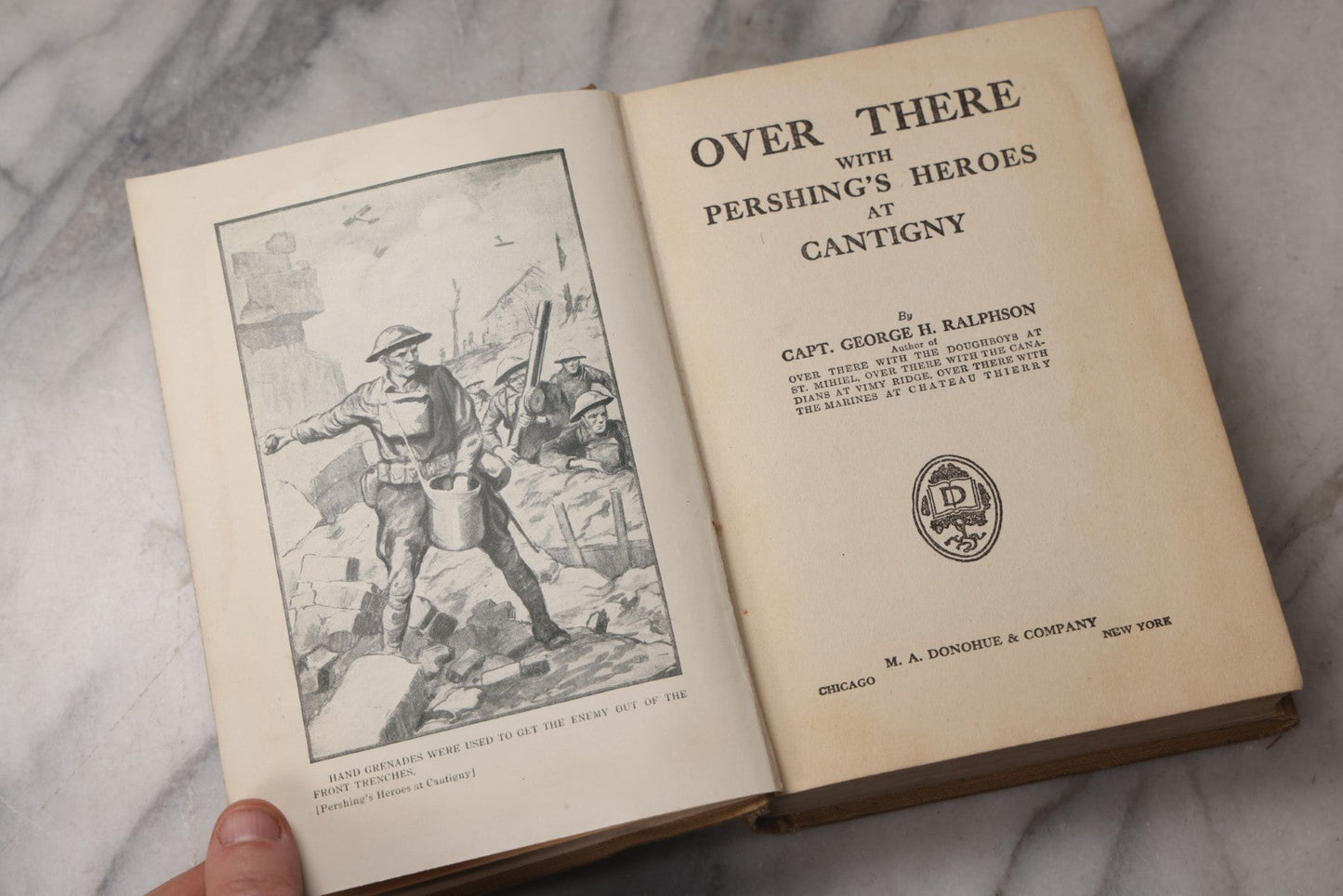Lot 077 - "Over There With Pershing's Heroes At Cantigny" Antique World War I Book By Capt. George H. Ralphson, Published By M. A. Donohue & Co., Chicago, 1919