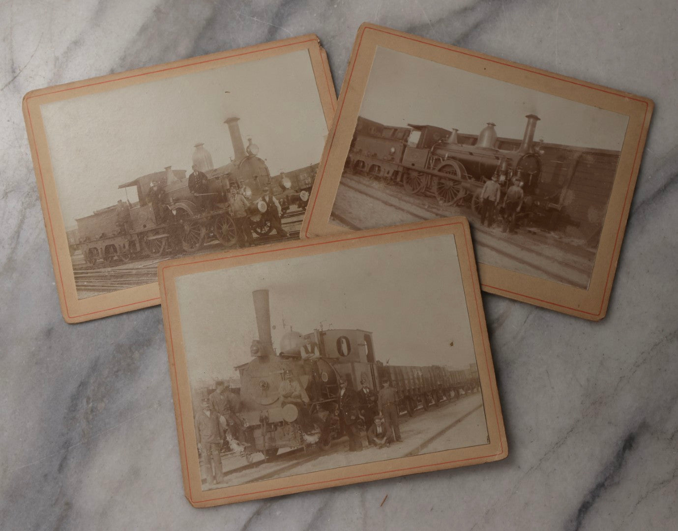 Lot 078 - Trio Of Antique Boarded Photographs Of Men Posing In Front Of Late 19th-Century Locomotives, Including Locomotive No. 77, With German Handwritten Notes On Verso Dated 1899