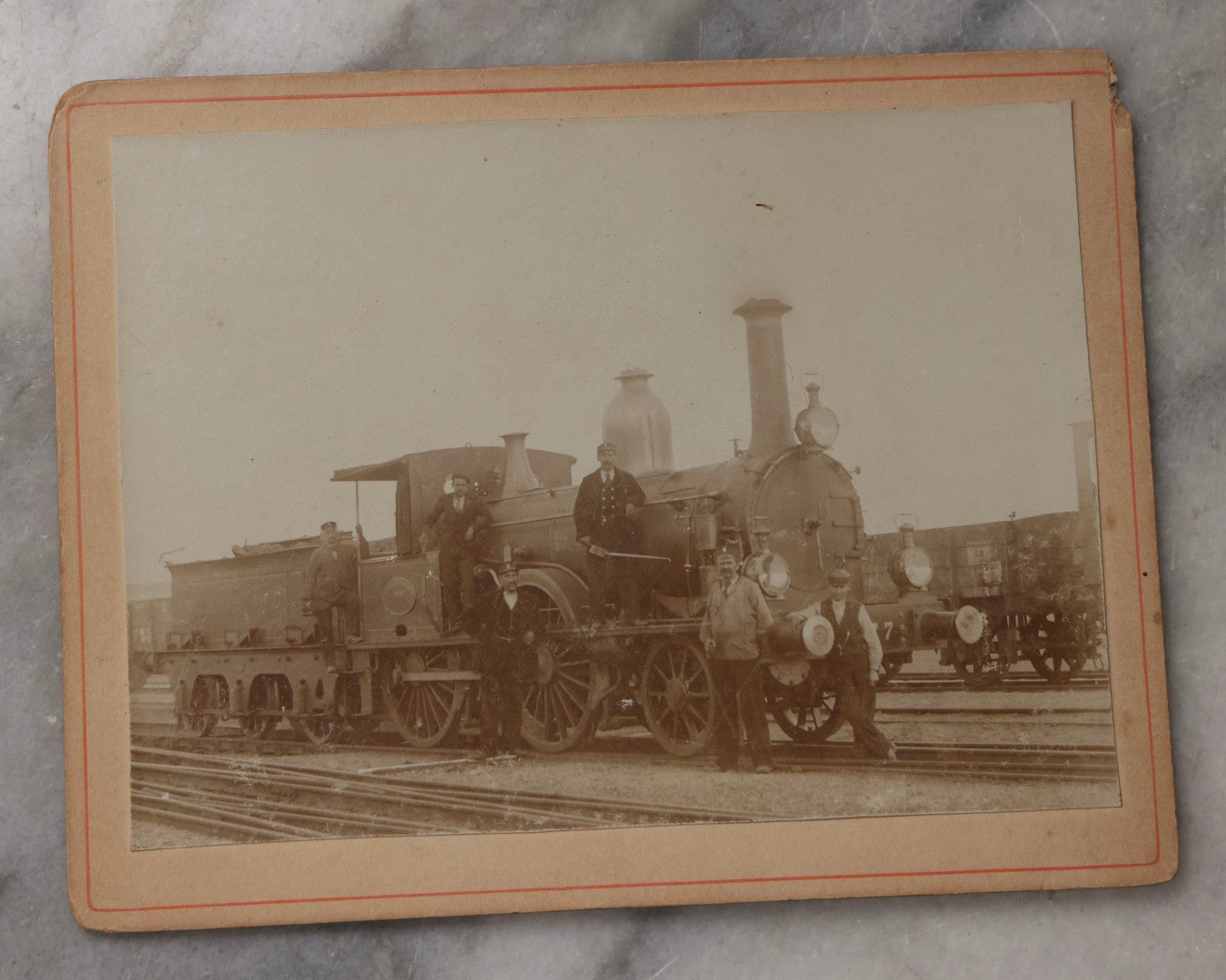 Lot 078 - Trio Of Antique Boarded Photographs Of Men Posing In Front Of Late 19th-Century Locomotives, Including Locomotive No. 77, With German Handwritten Notes On Verso Dated 1899