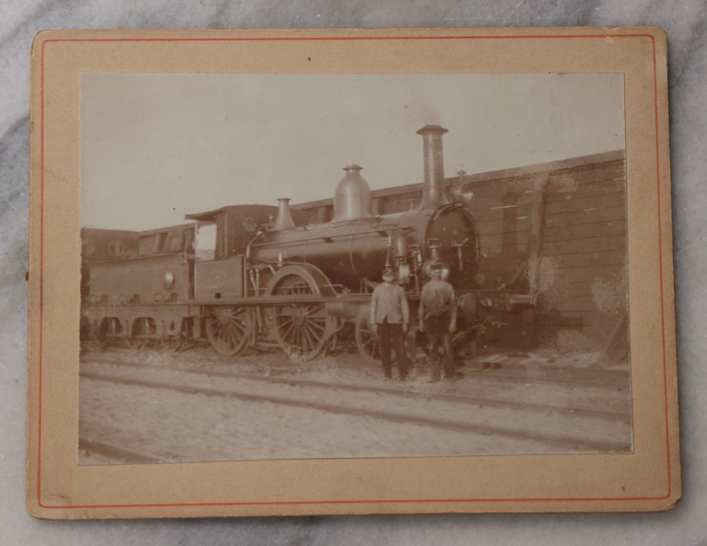 Lot 078 - Trio Of Antique Boarded Photographs Of Men Posing In Front Of Late 19th-Century Locomotives, Including Locomotive No. 77, With German Handwritten Notes On Verso Dated 1899