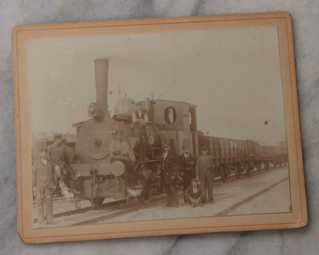Lot 078 - Trio Of Antique Boarded Photographs Of Men Posing In Front Of Late 19th-Century Locomotives, Including Locomotive No. 77, With German Handwritten Notes On Verso Dated 1899