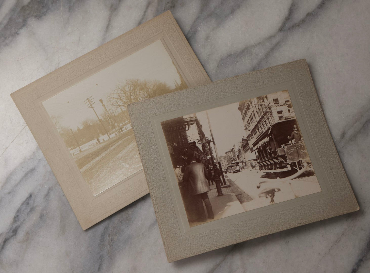 Lot 079 - Pair Of Antique Boarded Photographs Depicting Street Scenes Of Boston, Massachusetts, Circa 1890s With Trolleys, Trade Signs, And Pedestrians