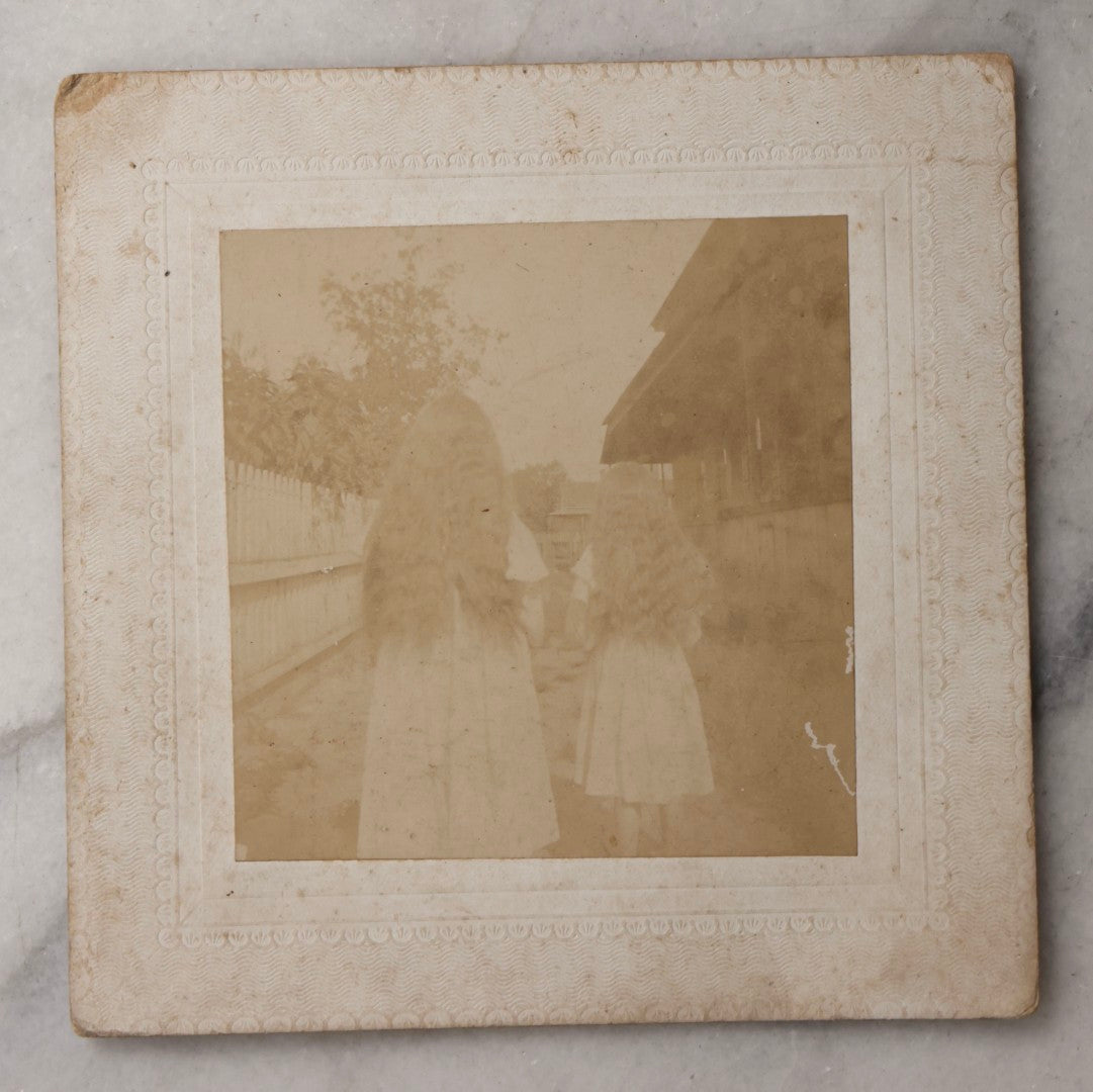 Lot 081 - Antique Boarded Photograph Of Two Girls With Matching Long Wavy Hair, Identified As "Alice Cook And Neffie Powell," With Humorous Note On Verso About Keeping “Snarls” Out Of Their Hair