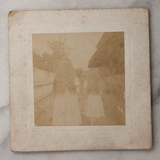 Lot 081 - Antique Boarded Photograph Of Two Girls With Matching Long Wavy Hair, Identified As "Alice Cook And Neffie Powell," With Humorous Note On Verso About Keeping “Snarls” Out Of Their Hair