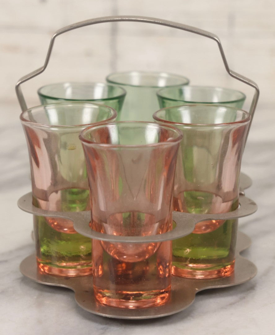 Lot 090 - Vintage Chrome Art Deco Shot Glass Caddy With Six Double Shot Glasses, Three Uranium Glass And Three Pink Depression Glass, Circa 1930s–1940s
