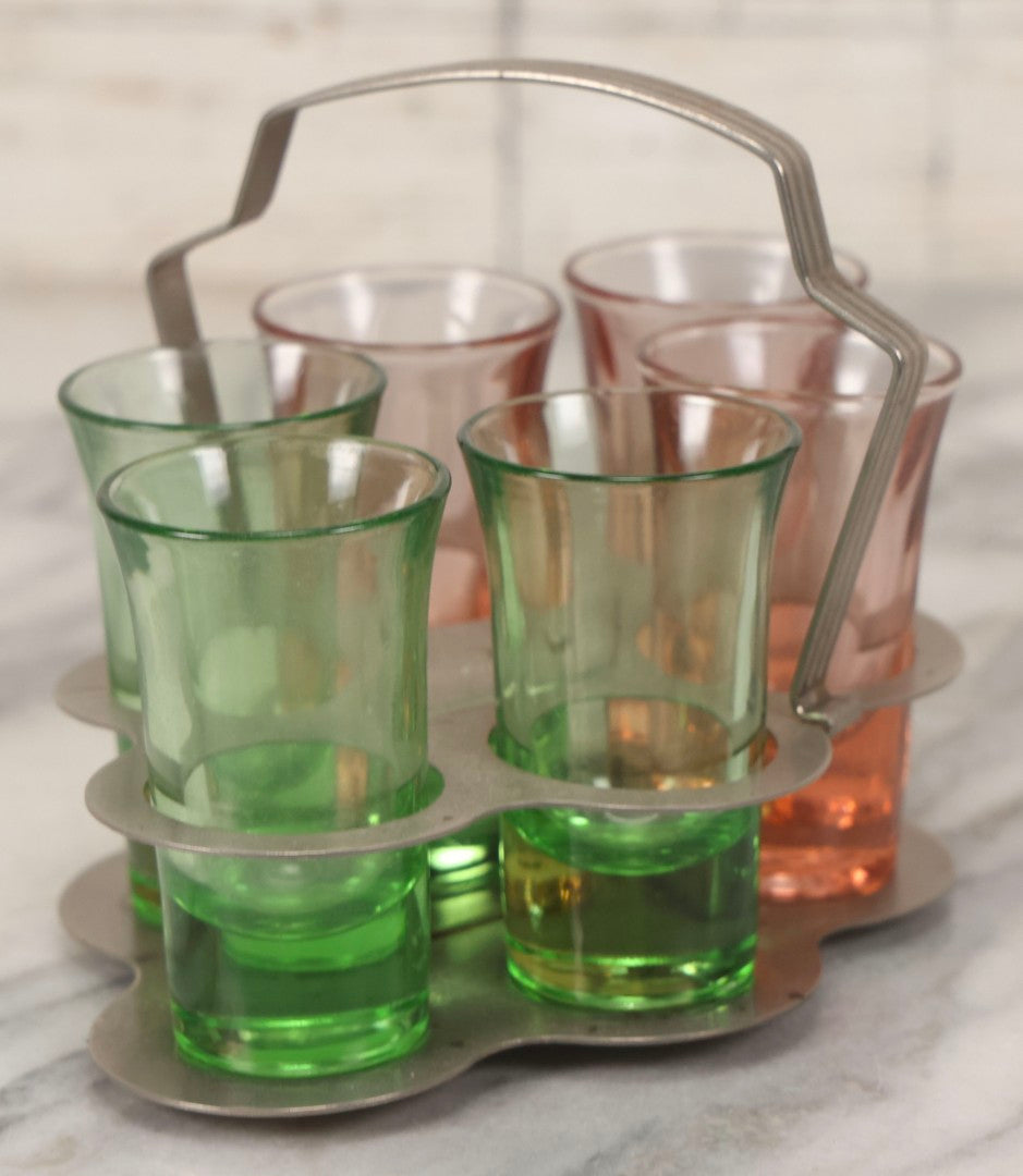 Lot 090 - Vintage Chrome Art Deco Shot Glass Caddy With Six Double Shot Glasses, Three Uranium Glass And Three Pink Depression Glass, Circa 1930s–1940s