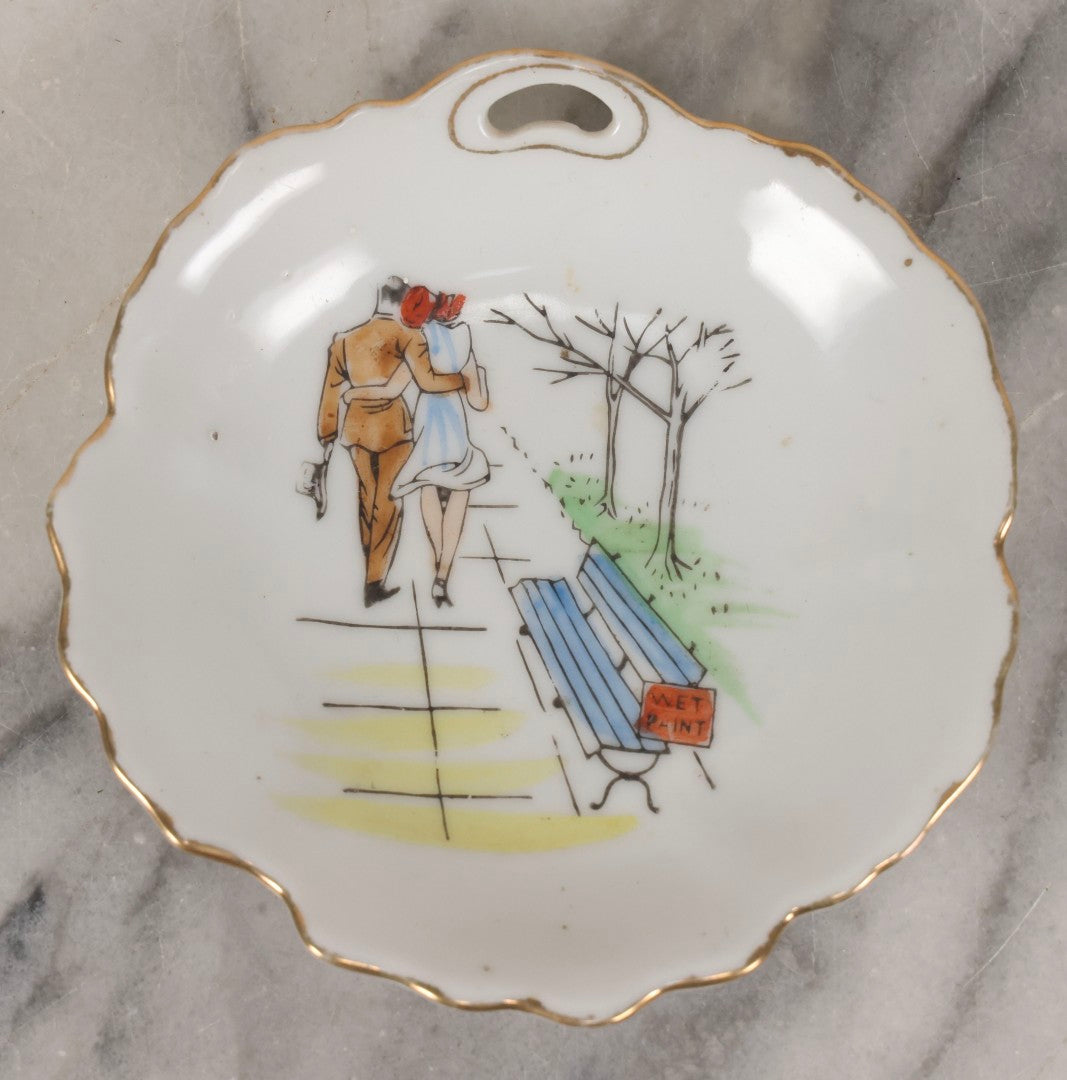 Lot 093 - Vintage Painted Porcelain Novelty Dish With Flirty Couple And Wet Paint Scene, Likely Made In Japan, 4-3/4" Diameter