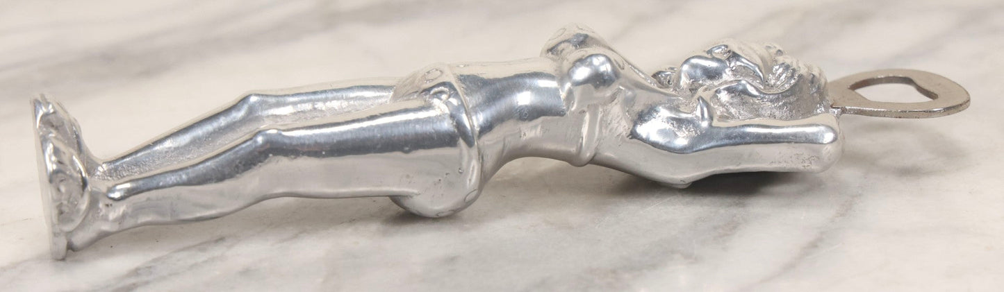 Lot 094 - Vintage Cast Aluminum Bikini Babe Bottle Opener, Woman With Sunglasses And Polka Dot Bikini, Circa 1980s 7-3/4" L