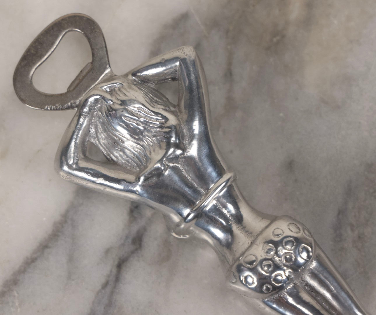 Lot 094 - Vintage Cast Aluminum Bikini Babe Bottle Opener, Woman With Sunglasses And Polka Dot Bikini, Circa 1980s 7-3/4" L