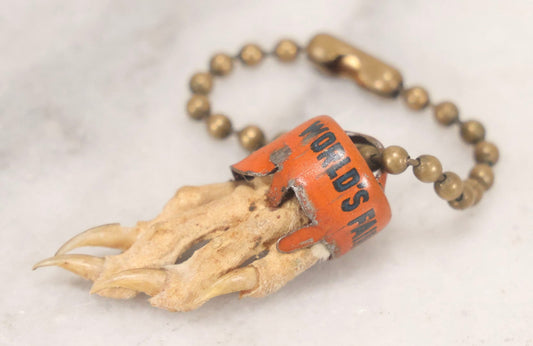 Lot 188 - Vintage 1939 New York World's Fair Lucky Rabbit's Foot Keychain With Tin Lithograph Mount Depicting Trylon And Perisphere