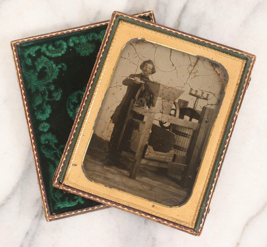 Lot 001 - Antique Half Plate Ambrotype Occupational Photograph Of Man Operating Apple Grinder And Cider Press, In Full Split Leatherette Case