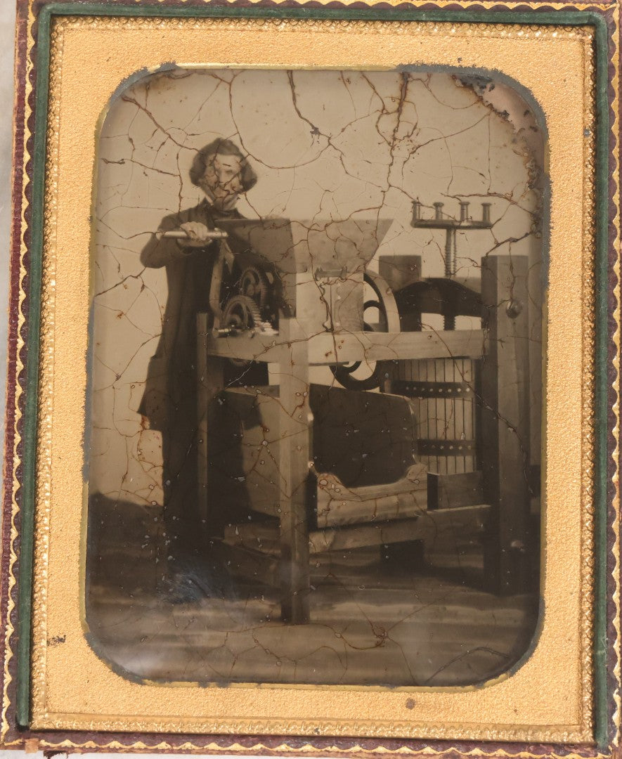 Lot 001 - Antique Half Plate Ambrotype Occupational Photograph Of Man Operating Apple Grinder And Cider Press, In Full Split Leatherette Case