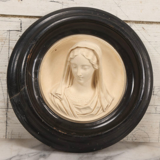 Lot 006 - Antique Carved Meerschaum Plaque Of The Virgin Mary In Black Lacquered Wood Frame, Likely French, Early 20th Century, 10" Diameter