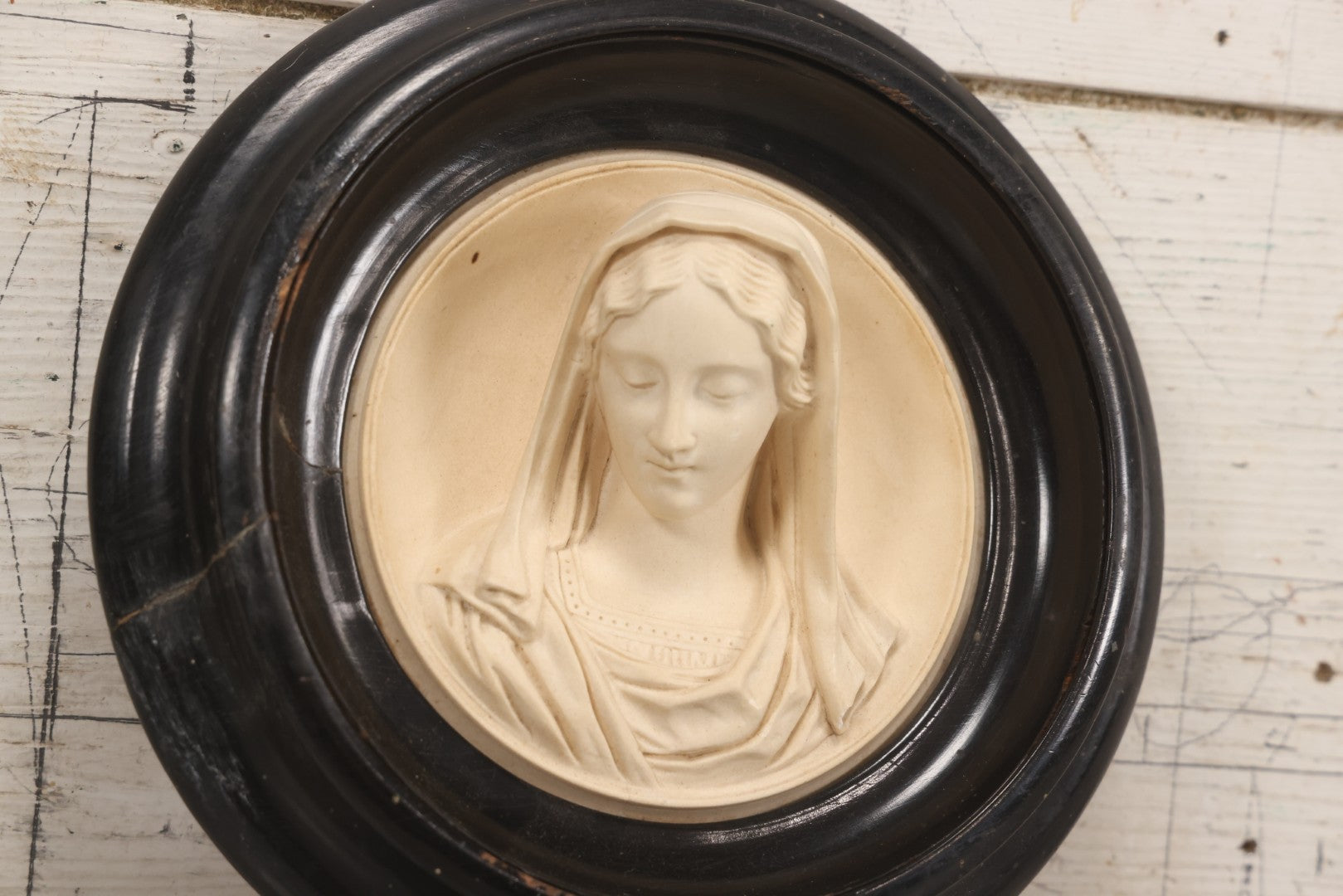 Lot 006 - Antique Carved Meerschaum Plaque Of The Virgin Mary In Black Lacquered Wood Frame, Likely French, Early 20th Century, 10" Diameter