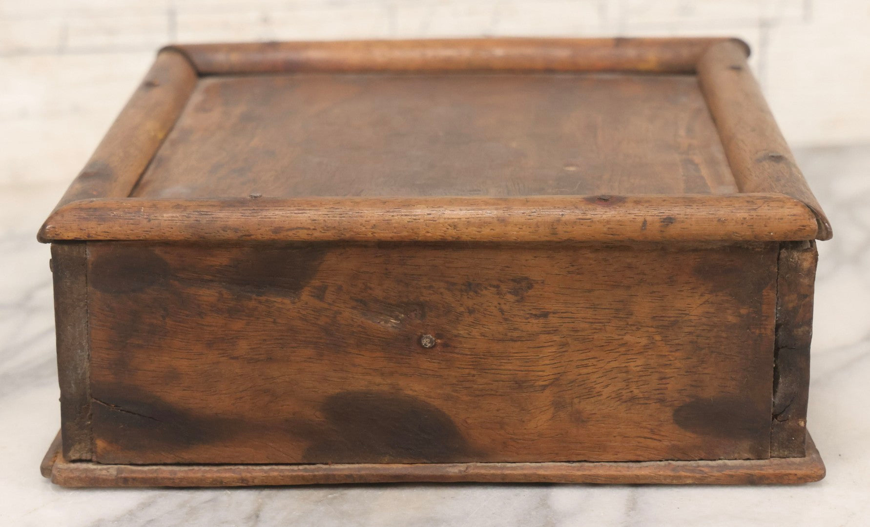 Lot 010 - Antique Primitive Handmade Wooden Slide-Top Box With Brass Medallion Decorations And Nailed Joinery