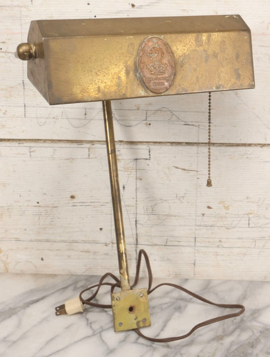 Lot 015 - Antique Brass Desk-Mount Light Fixture From The Ritz-Carlton Hotel, Boston, Massachusetts, With Lion And Crown Badge
