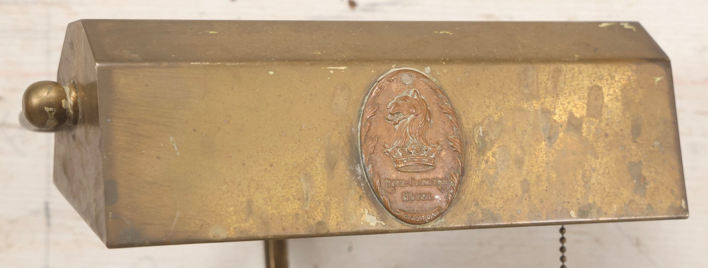 Lot 015 - Antique Brass Desk-Mount Light Fixture From The Ritz-Carlton Hotel, Boston, Massachusetts, With Lion And Crown Badge