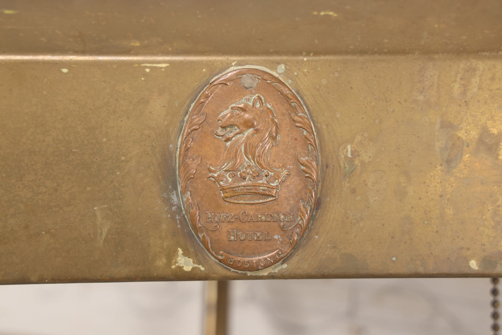 Lot 015 - Antique Brass Desk-Mount Light Fixture From The Ritz-Carlton Hotel, Boston, Massachusetts, With Lion And Crown Badge