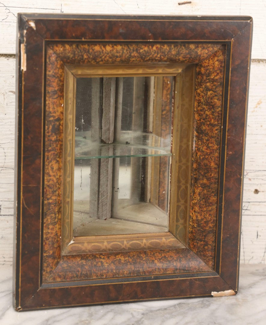Lot 016 - Antique Miniature Mirrored Corner Wall Shelf With Textured Paint Frame, Glass Interior Shelf, And Metal Mounting Bracket, 8-3/4" x 10-1/2"