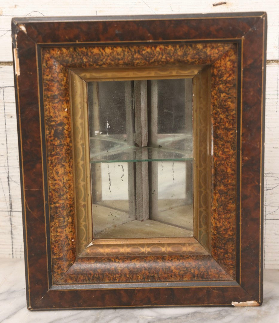 Lot 016 - Antique Miniature Mirrored Corner Wall Shelf With Textured Paint Frame, Glass Interior Shelf, And Metal Mounting Bracket, 8-3/4" x 10-1/2"