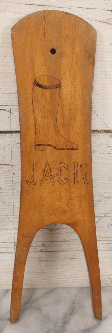 Lot 017 - Antique Folk Art Wooden Boot Jack With Wood Burned Naive Boot Illustration And Branch-Style “Jack” Lettering, 14-1/4" H