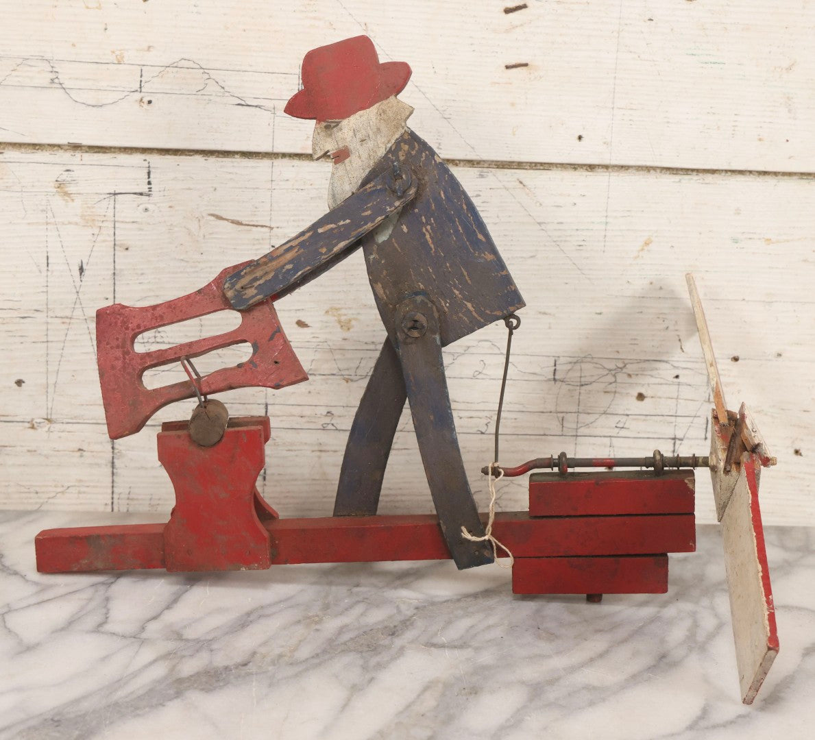 Lot 018 - Antique Hand Painted Wooden Folk Art Whirligig With Man Sawing Log, Missing Two Propeller Blades, 15-1/4" L