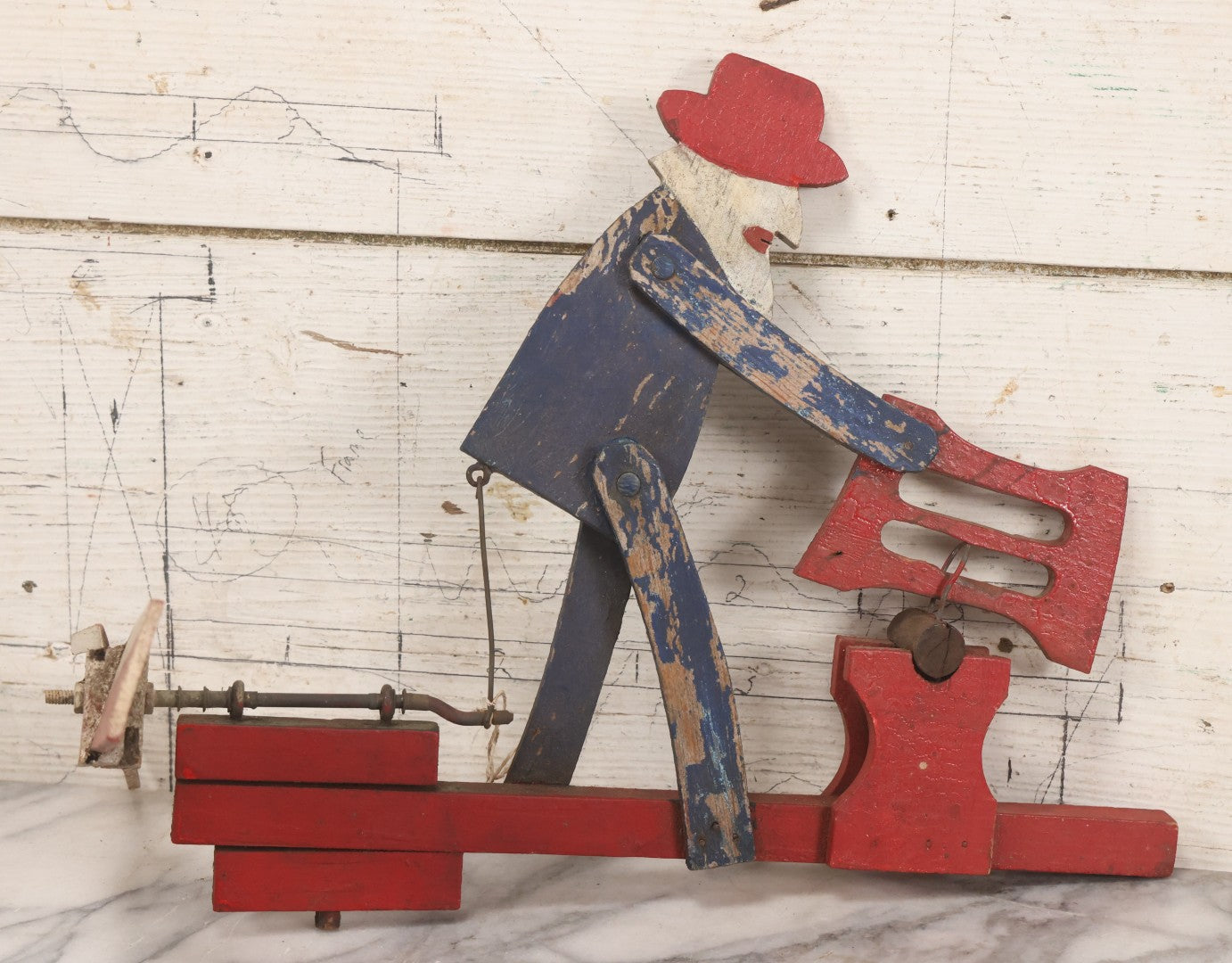 Lot 018 - Antique Hand Painted Wooden Folk Art Whirligig With Man Sawing Log, Missing Two Propeller Blades, 15-1/4" L