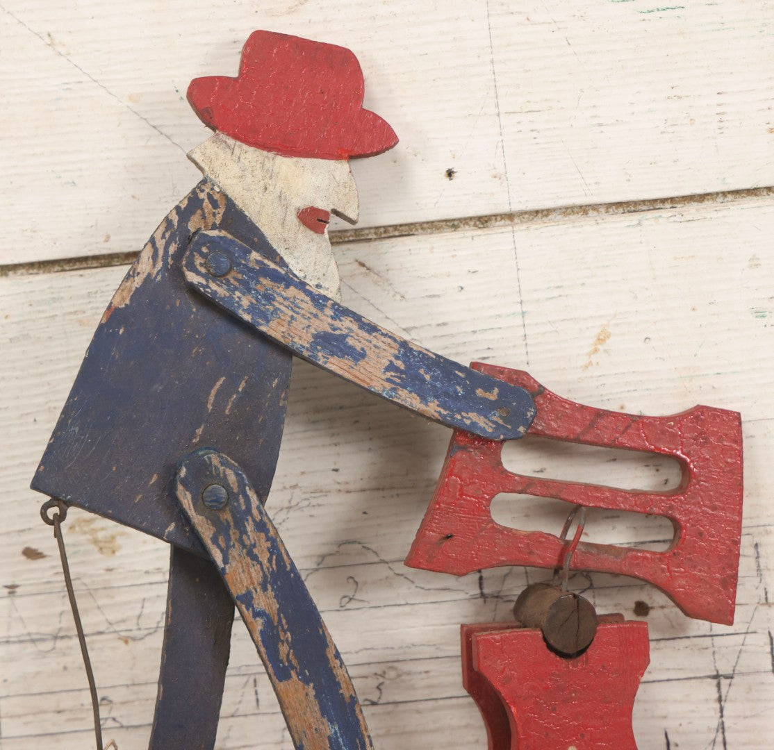Lot 018 - Antique Hand Painted Wooden Folk Art Whirligig With Man Sawing Log, Missing Two Propeller Blades, 15-1/4" L