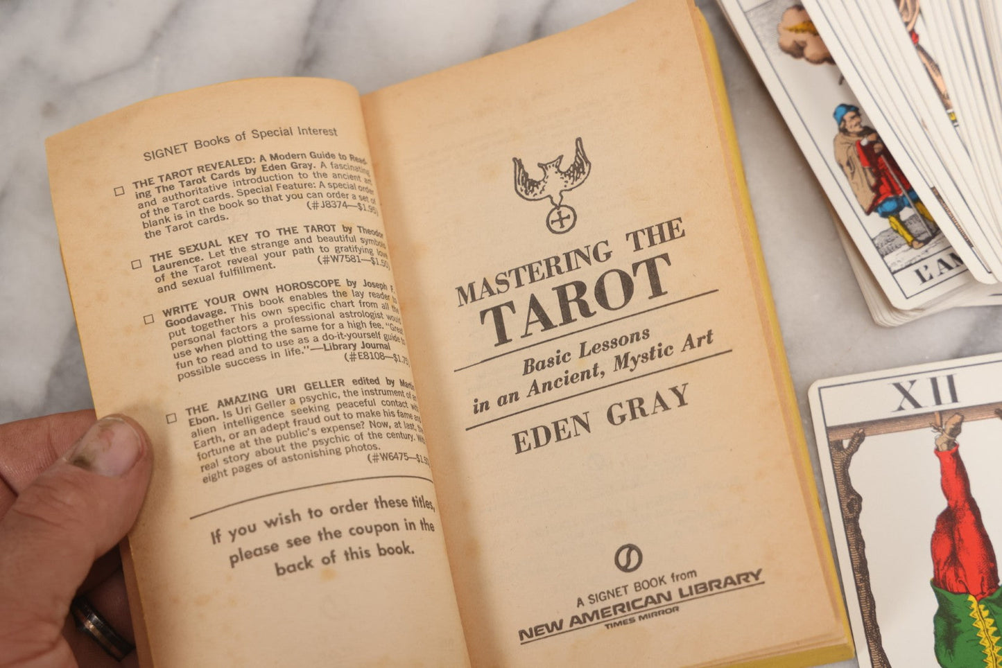 Lot 034 - Pair Of Vintage Tarot Items Including J. Muller & Cie French Marseille-Style Tarot Deck Of 78 Cards With Red Slip Case And "Mastering The Tarot" Paperback Book By Eden Gray, 1973