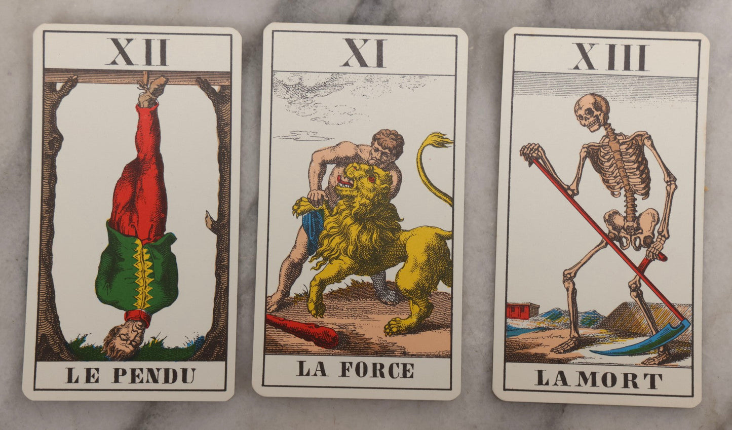 Lot 034 - Pair Of Vintage Tarot Items Including J. Muller & Cie French Marseille-Style Tarot Deck Of 78 Cards With Red Slip Case And "Mastering The Tarot" Paperback Book By Eden Gray, 1973