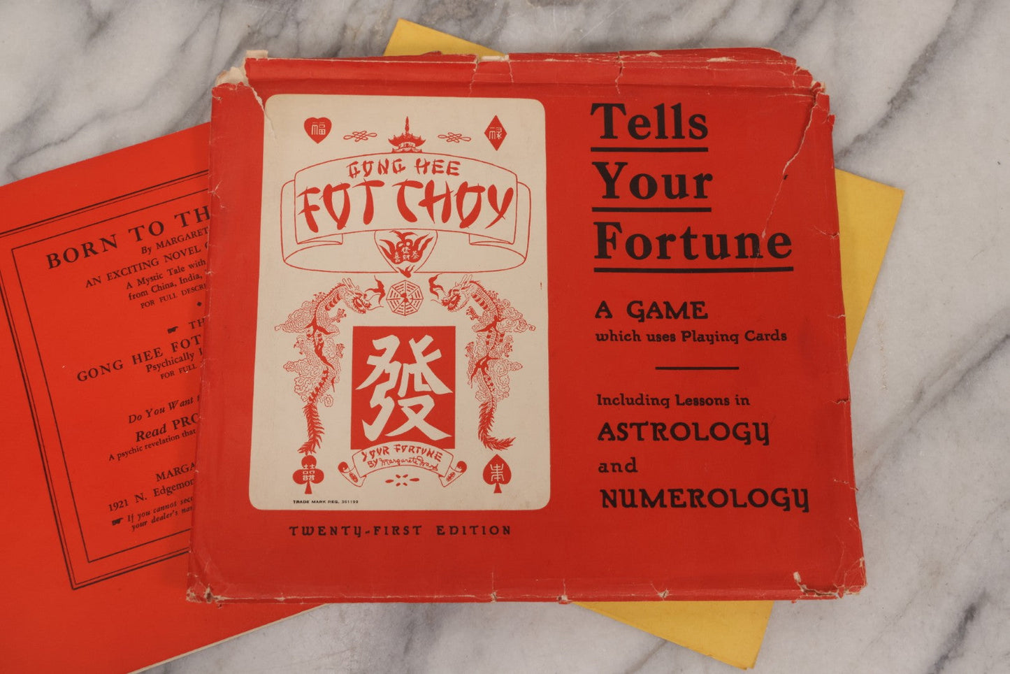 Lot 035 - Vintage "Gong Hee Fot Choy" Fortune-Telling Game Booklet With Folding Houses Chart, By Margarete Ward, Including Lessons In Astrology And Numerology, Twenty-First Edition, Copyright 1938
