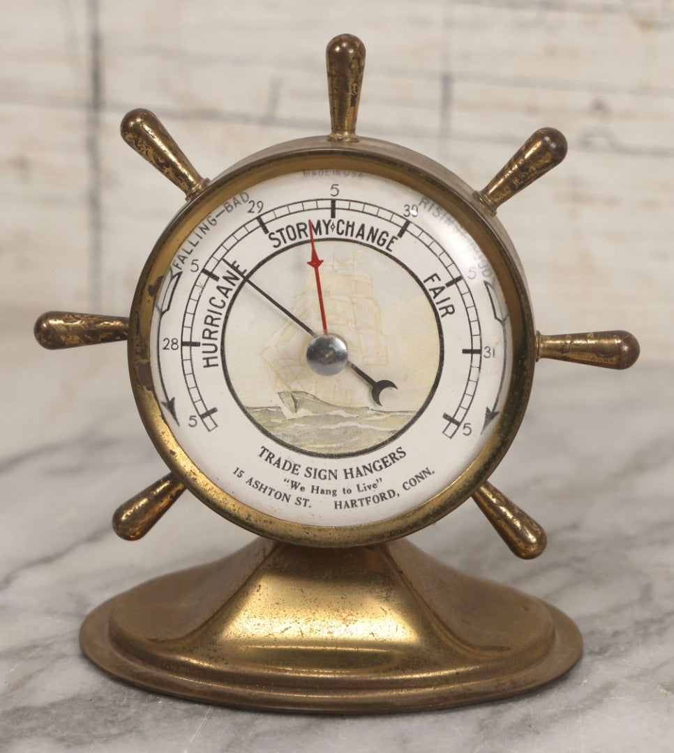 Lot 039 - Vintage Nautical Advertising Barometer For Trade Sign Hangers With Brass Ship's Wheel And “We Hang To Live” Slogan, Hartford, Connecticut, 4-3/4" H