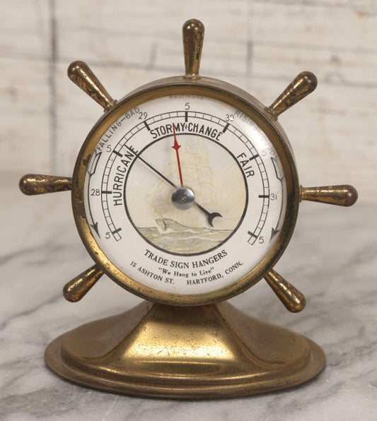 Lot 039 - Vintage Nautical Advertising Barometer For Trade Sign Hangers With Brass Ship's Wheel And “We Hang To Live” Slogan, Hartford, Connecticut, 4-3/4" H