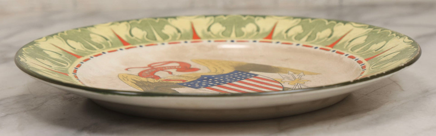 Lot 043 - Antique Hand Colored Transferware Pottery Patriotic Plate By Frank Beardmore & Co., Fenton, "National Emblems" Line With Bald Eagle, Patriotic Shield, And "E Pluribus Unum" Banner, 10" Diameter