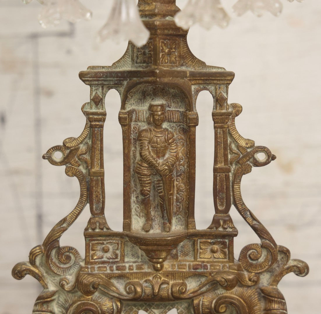 Lot 045 - Antique Brass Figural Girandole Candle Stand With Knight And Sword Motif And Original Green And Clear Crystal Drops, 15-3/4" H
