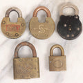 Lot 050 - Grouping Of Five Vintage And Antique Metal Padlocks With Assorted Cast Markings, Sold As Found Without Keys