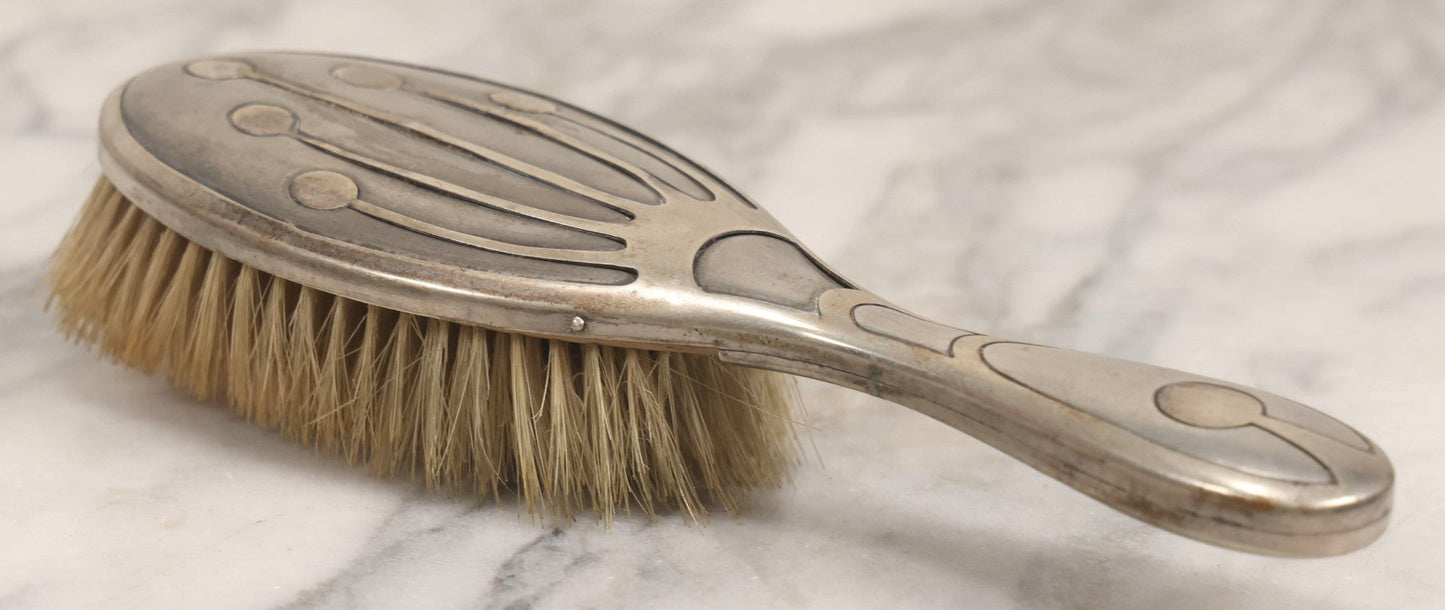 Lot 053 - Antique Art Deco Metal Clad Dresser Brush With Stylized Radiating Oval Motif, 9" L