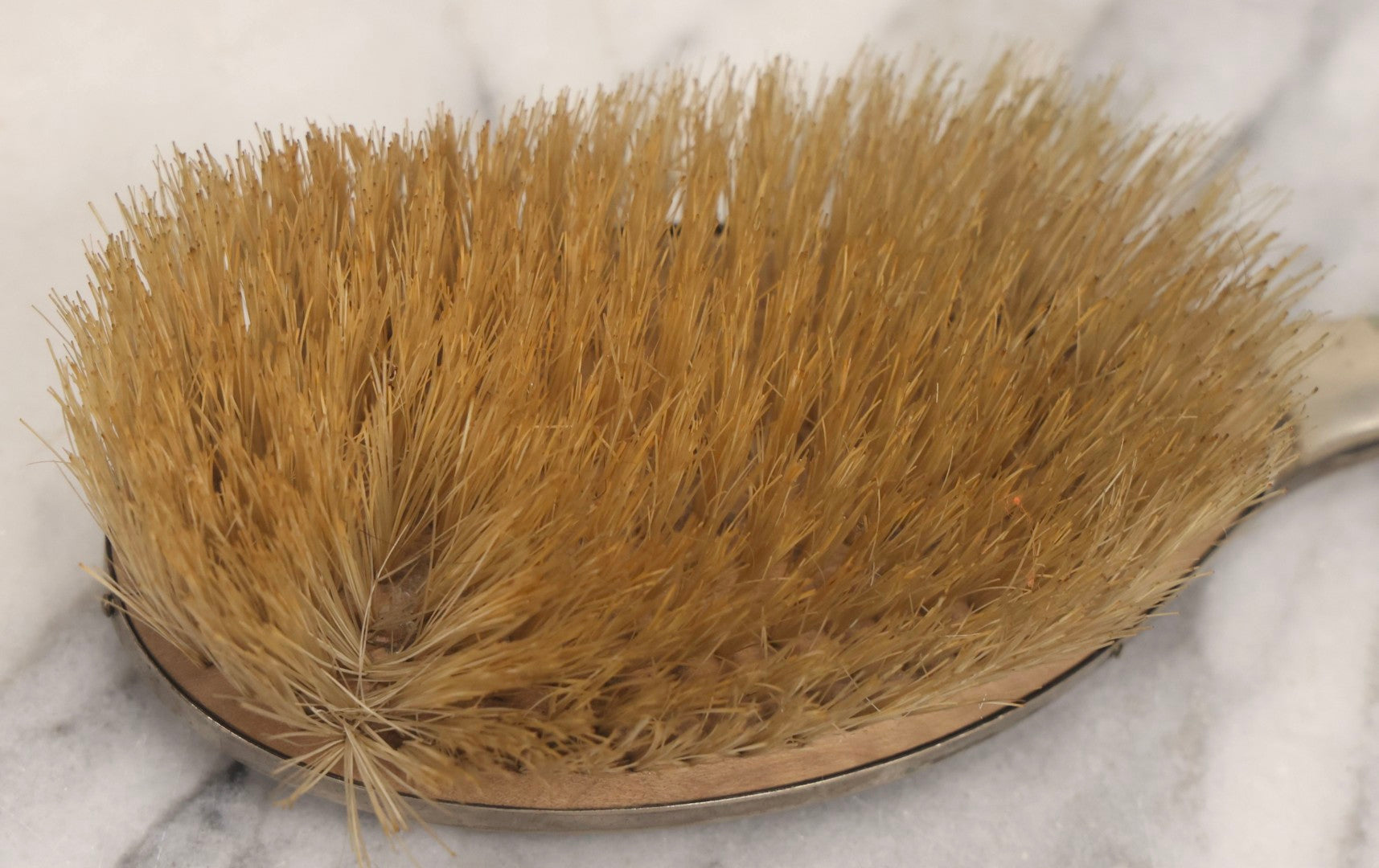 Lot 053 - Antique Art Deco Metal Clad Dresser Brush With Stylized Radiating Oval Motif, 9" L