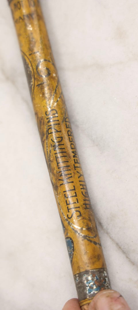Lot 054 - Antique Gloria Brand Highly Tempered Steel Knitting Pins In Original Tin Lithograph Tube With Woman's Face Motif, Made In Germany, 9-3/4" L