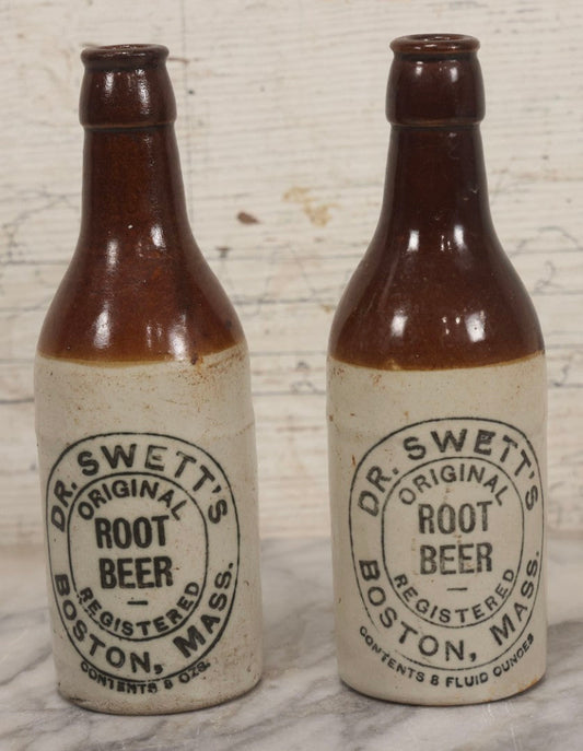 Lot 059 - Pair Of Antique Stoneware Soda Bottles For Dr. Swett's Original Root Beer, Boston, Massachusetts, 8 Fluid Ounces, 7-3/4" H Each