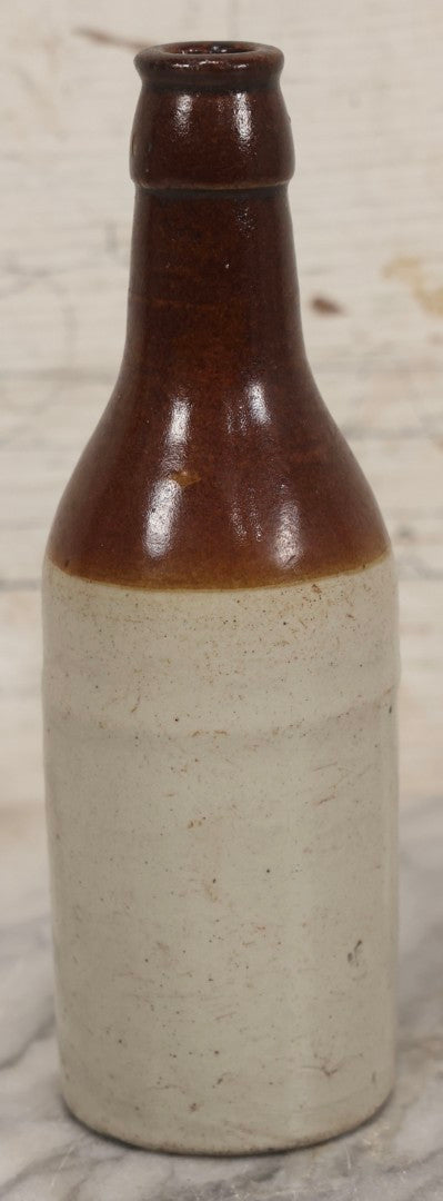 Lot 059 - Pair Of Antique Stoneware Soda Bottles For Dr. Swett's Original Root Beer, Boston, Massachusetts, 8 Fluid Ounces, 7-3/4" H Each