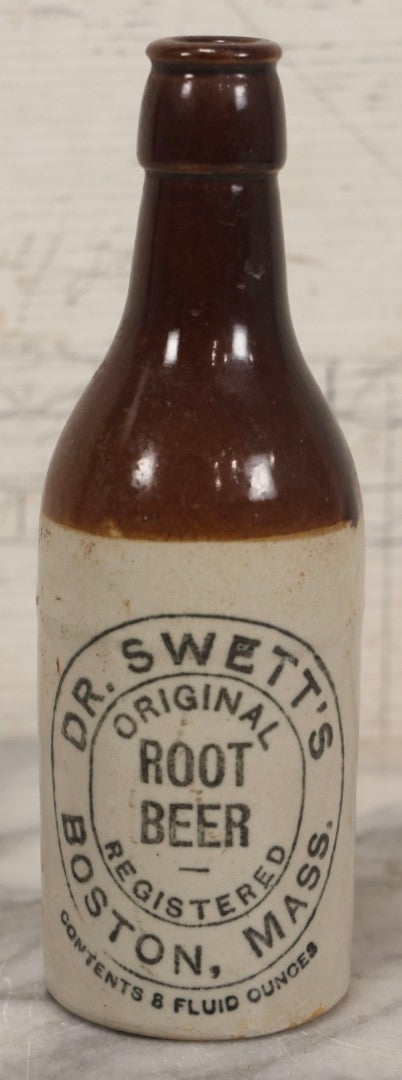 Lot 059 - Pair Of Antique Stoneware Soda Bottles For Dr. Swett's Original Root Beer, Boston, Massachusetts, 8 Fluid Ounces, 7-3/4" H Each