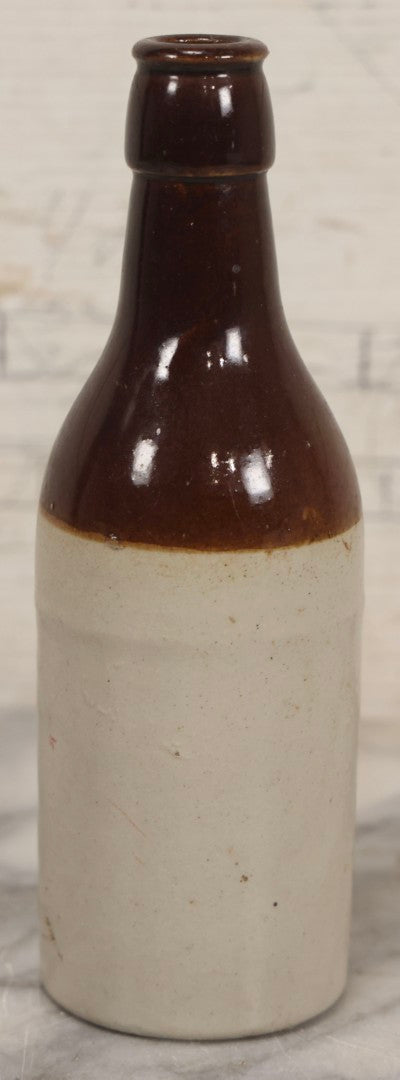 Lot 059 - Pair Of Antique Stoneware Soda Bottles For Dr. Swett's Original Root Beer, Boston, Massachusetts, 8 Fluid Ounces, 7-3/4" H Each