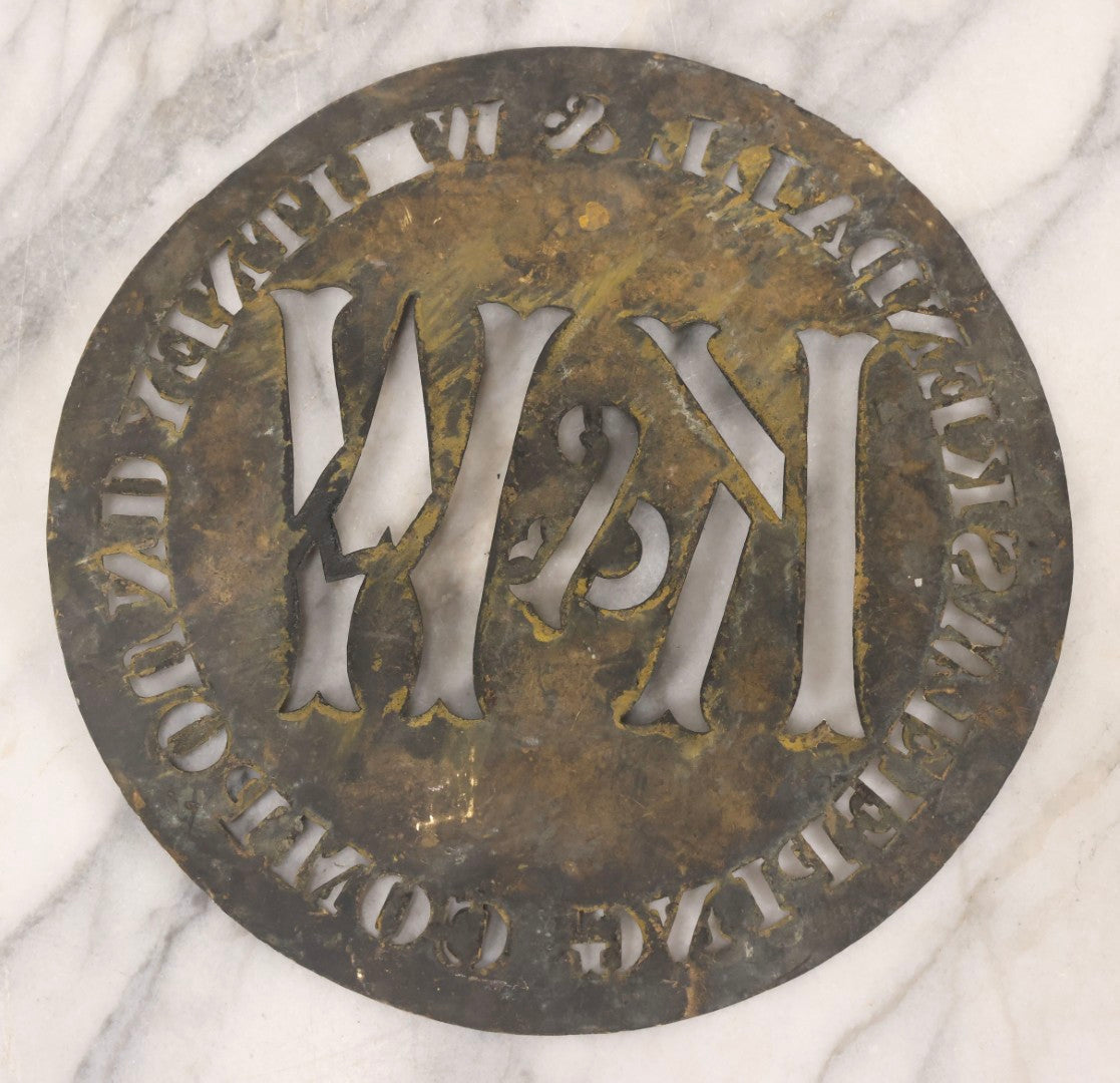 Lot 061 - Antique Die Cut Stamped Brass Advertising Stencil For Kendall & Whitney Sweeping Compound With Large “K & W” Monogram, 10" Diameter
