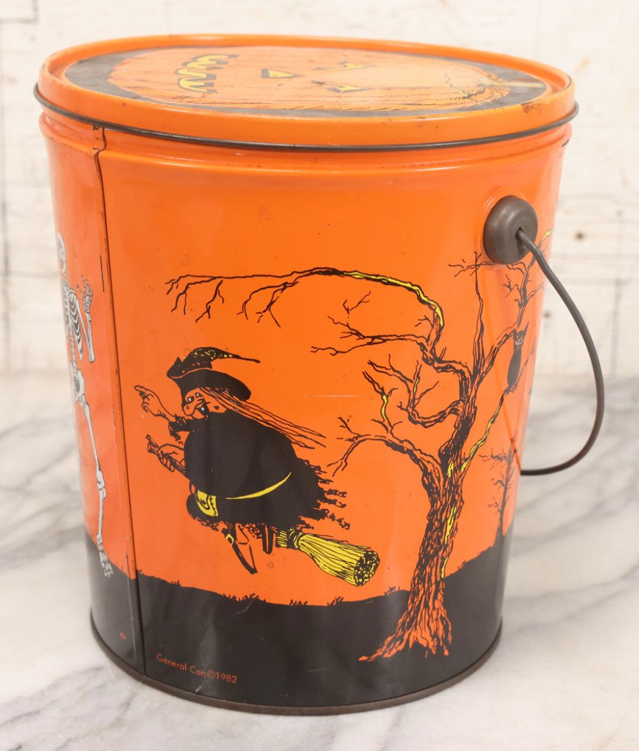 Lot 064 - Vintage Tin Lithograph Halloween Can Bucket With Ghosts, Skeleton, Witch, Jack-O-Lantern, And Haunted House, Copyright General Can Co. Inc., 1982, Montebello, California, 8-3/8" H