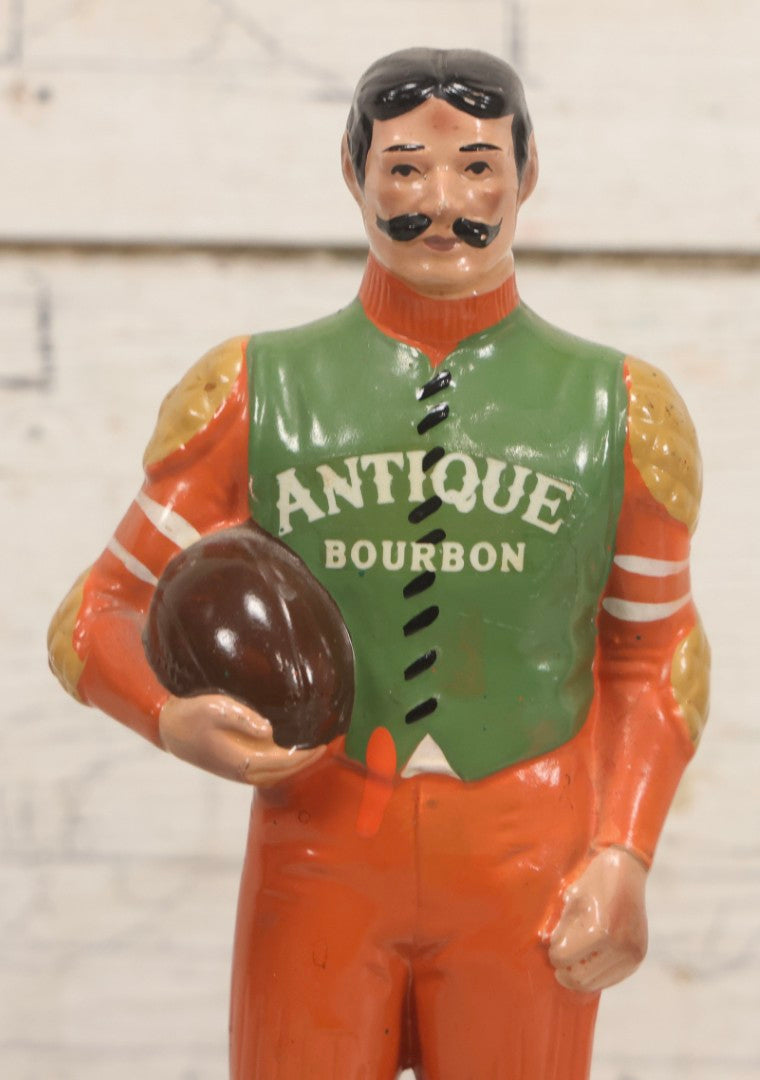Lot 065 - Vintage Ceramic “Antique Bourbon” Advertising Ashtray With Standing Football Mascot, Japan, 10-3/4" H