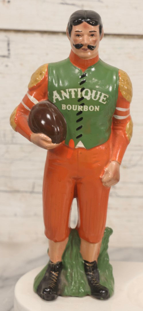 Lot 065 - Vintage Ceramic “Antique Bourbon” Advertising Ashtray With Standing Football Mascot, Japan, 10-3/4" H