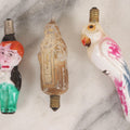 Lot 071 - Trio Of Antique Hand Painted Figural Candelabra Light Bulbs Including Santa Claus, Little Boy, And Parrot, 3-1/2" To 4-1/4" L