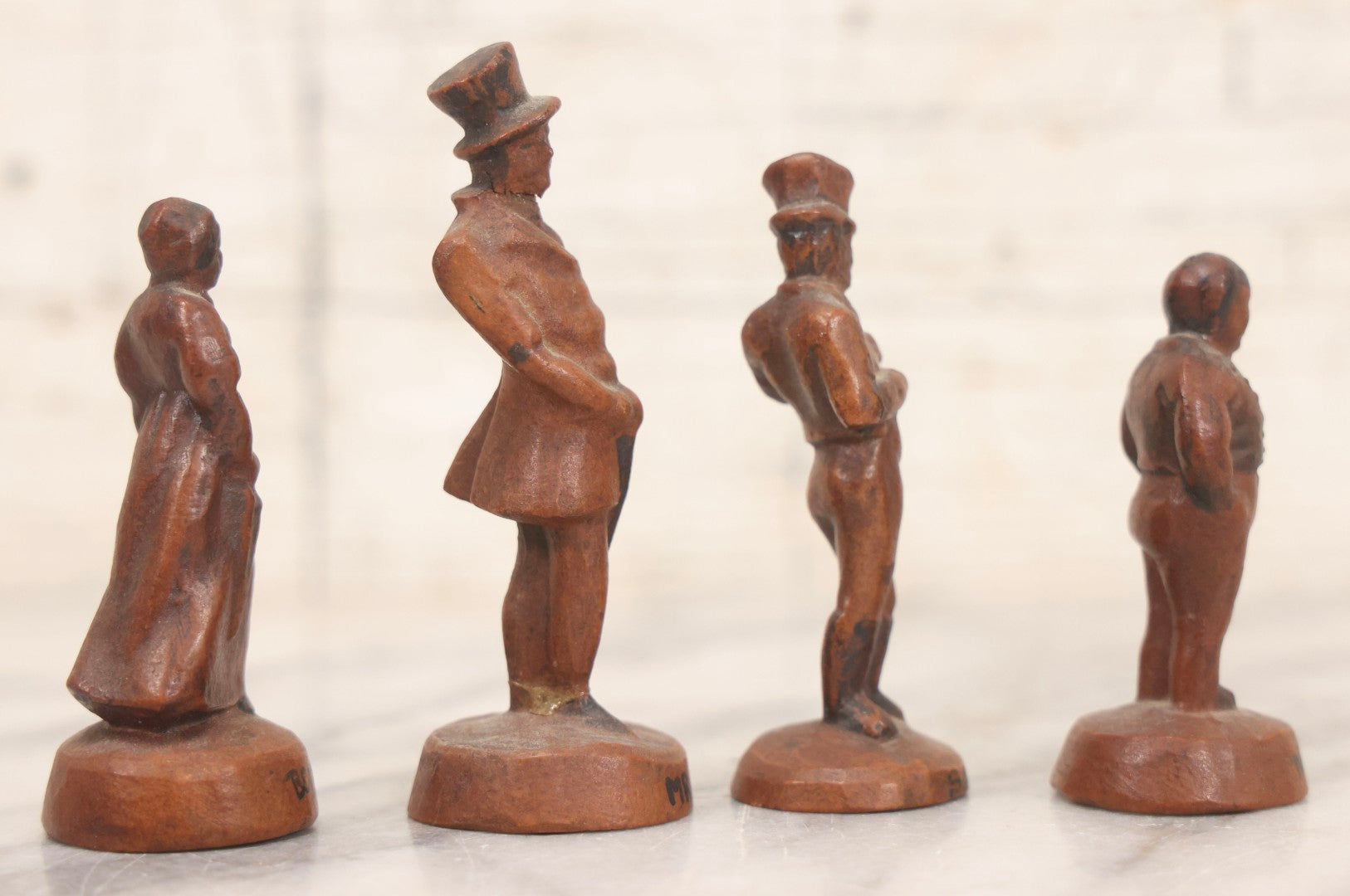 Lot 072 - Grouping Of Four Vintage Composition Charles Dickens Character Figurines By Bonnie Blink Studios, Winchester, Massachusetts, “Betsy Trotwood,” “The Fat Boy,” “Sam Weller,” And “Mr. Micawber," 2-1/2" To 3-1/2" H